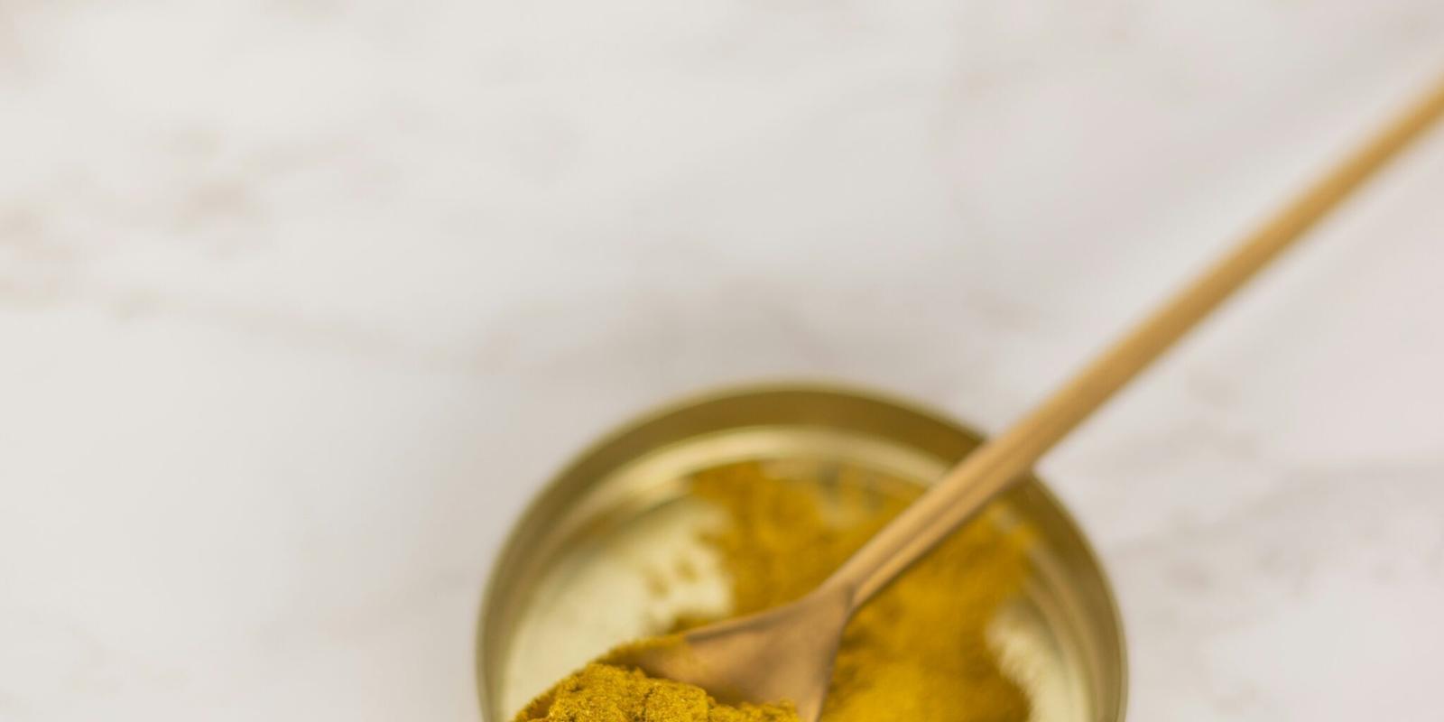 stainless steel spoon on stainless steel spoon on clear glass bowl